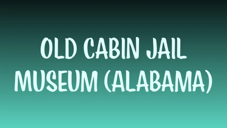 Historic wooden cabin jail exhibit in Alabama museum